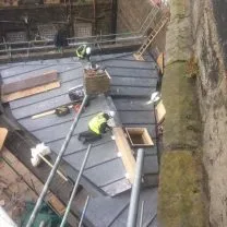 Image showing lead workers laying new lead roof